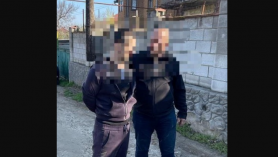 Momentul în care Mihail Șaran este reținut de oamenii legii